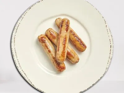 First Watch 2pc Side of Turkey Sausage Link - two lean turkey sausage links served as a savory breakfast side.