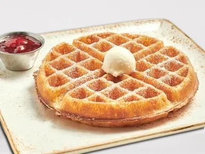 First Watch Belgian Waffle - light and airy waffle served with mixed berry compote and powdered cinnamon sugar.