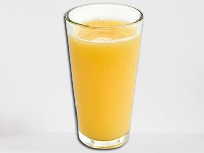 Cold Squeezed Orange Juice from First Watch, served fresh in a glass.