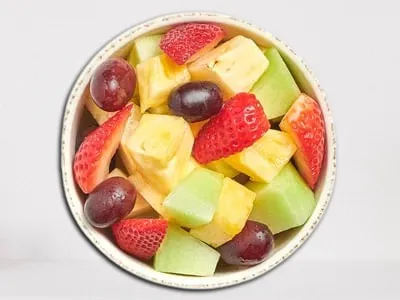 First Watch Cup of Fresh Seasonal Fruit - a vibrant mix of freshly cut seasonal fruits served chilled.