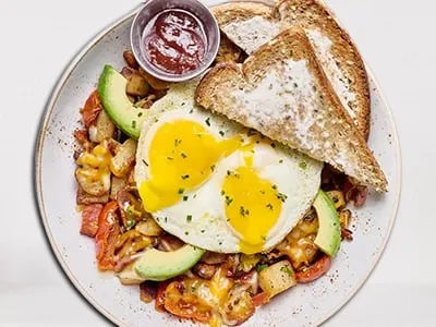 First Watch Farmhouse Hash with eggs and fresh vegetables