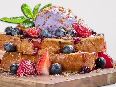 First Watch Wild Berry Lavender French Toast with Fresh Berries and Whipped Cream

